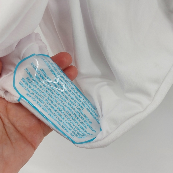 ASOS DESIGN skinny strap deep plunge tie front swimsuit in shiny white - Picture 7 of 9